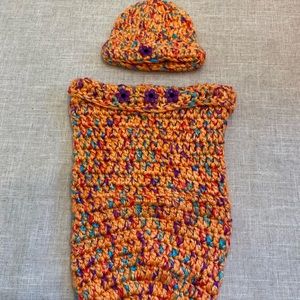 Crocheted baby hat with matching cocoon. Perfect for baby’s first pictures.